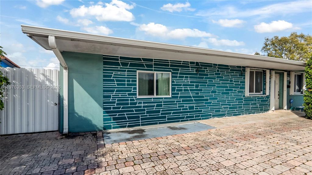 Photo of 7861 Sheridan St, Hollywood, FL 33024 (MLS # A11976353)