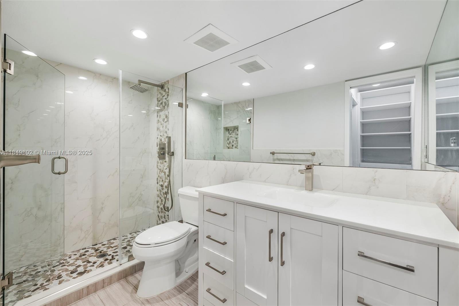 Welcome to this spacious 2-bedroom, 2-bath condo in Kendallwood Villas. This updated second-floor unit features a modern kitchen with stainless steel appliances, quartz countertops, and plenty of cabinet space. Walk-in closet, private balcony, and the convenience of an assigned parking spot—plus plenty of guest parking. The community offers a pool, and well-maintained common spaces, perfect for relaxing or entertaining.