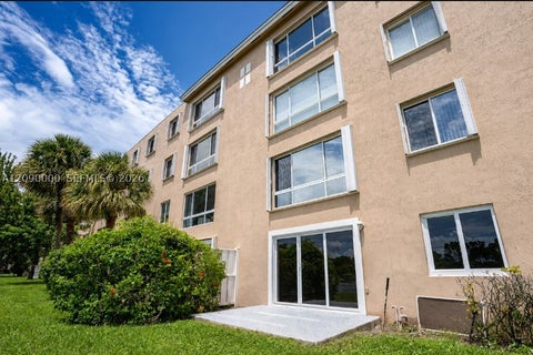 Photo of 5810 Crystal Shores Dr #102, Boynton Beach, FL 33437 (MLS # A12090000)