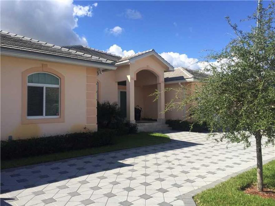 "MUST USE SHOW ASSIST" New 2014 residence is Estates by The Falls, exclusive guard gated private enclave. Perfect for executive in a secure & quiet community. Elegant & spacious 4BD residence has it all. Formal living & dining rooms. Gourmet kitchen w/woo d & granite. Large master suite w/luxurious bath. Covered terrace w/pool. Porcelain & wood floors. Other features include impact windows/doors, barrel tile roof, crown molding and volume ceilings. Tenant must obtain and provide proof of Renter's Insurance