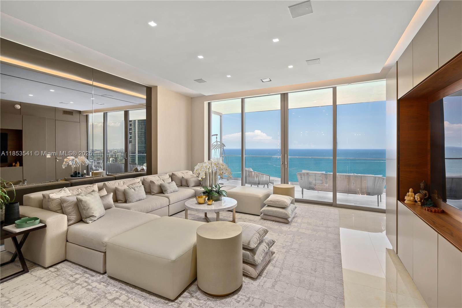 Experience luxury living at Residences by Armani Casa, created by the renowned architect Cesar Pelli & Giorgio Armani. This STUNNING 3 bed 3.5 bath unit is the most sought-after line at the 5-star Armani, offering unobstructed ocean & city bay views. This unit features high-end luxury finishes, a top-of-the-line kitchen w/ Wolf appliances, a Sub-Zero refrigerator, & a wine cooler. Professionally Decorated & Furnished, providing the ultimate in luxury living. The unit is fully finished & provides access to resort-style amenities such as a 2-story full-service spa, private restaurant w/ room service, game room, cigar/wine room, gym, ocean-view yoga studio w/ Pilates, movie theater, child's playroom, concierge, & 24-hour valet services. Available second week of January 2026.