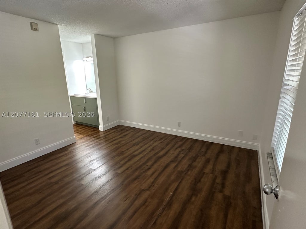Photo of 10757 Cleary Blvd #307, Plantation, FL 33324 (MLS # A12077181)
