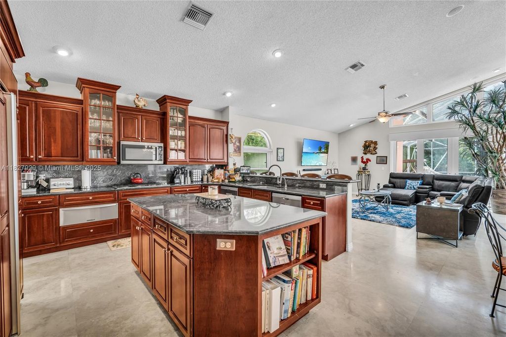 Photo of 7562 NW 51st Pl, Coral Springs, FL 33067 (MLS # A11827929)