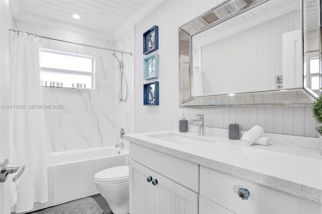 Photo of 1247 SE 7th Ct, Deerfield Beach, FL 33441 (MLS # A12011235)