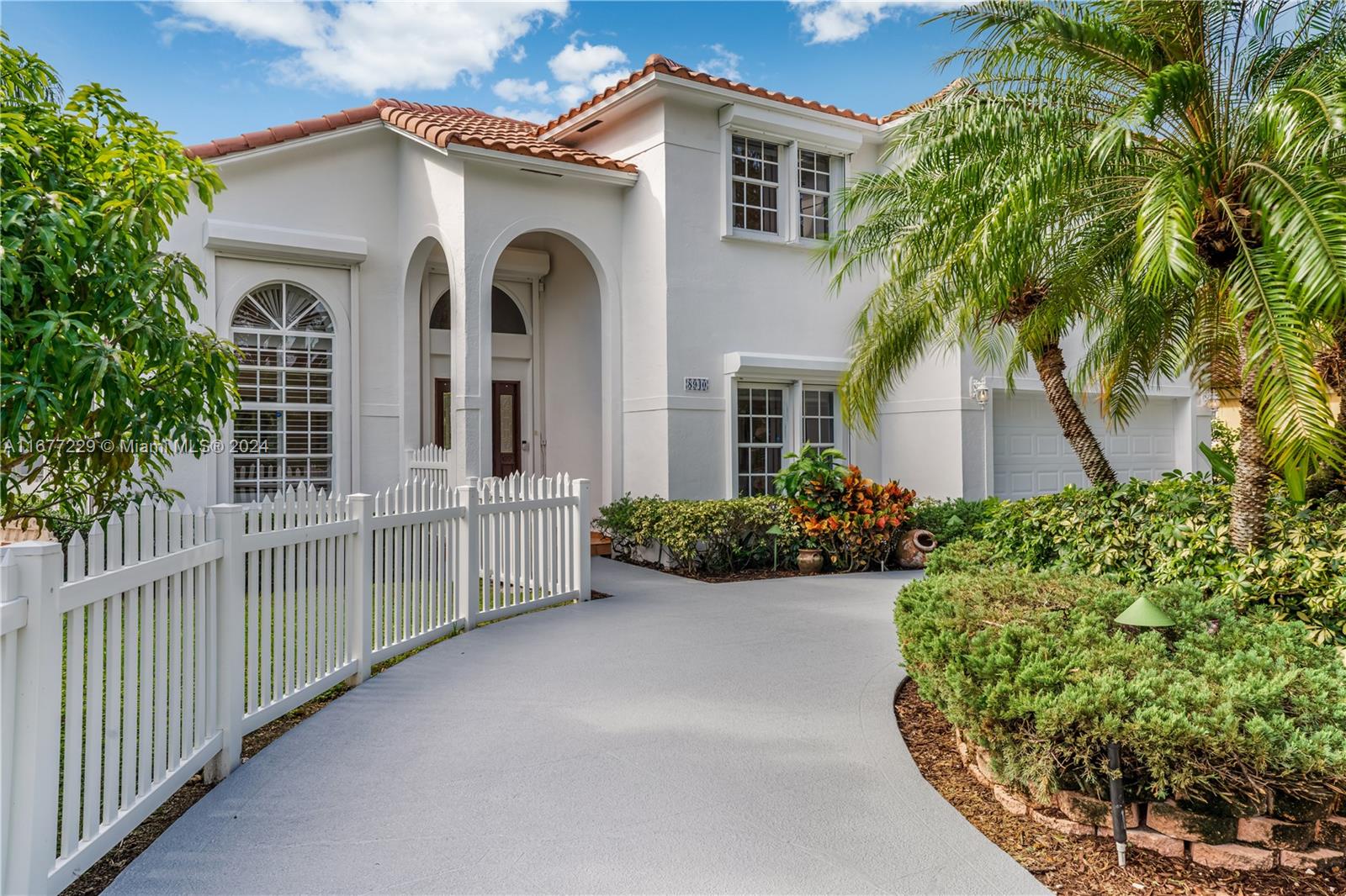Enchanting Palmetto Bay 2-story 5B/3B home!This spacious property is a picturesque blend of modern comfort & natural beauty.Inside find a formal living/dining area w/ soaring ceilings,a kitchen flowing into the family room, & a screened-in patio with a pool & waterfall,all with expansive canal views!There is 1 BD/1BA downstairs & 4BD/2BA upstairs including a generous primary suite.The white picket-fenced side yard features mango trees & inviting seating areas for play & gatherings.Eco-conscious w/ solar panels, propane tank, & a generator, this home keeps energy costs low.The welcoming neighborhood is perfect for families & pet owners, w/a voluntary WhatsApp group keeping everyone informed & engaged in local happenings.Who is ready to make new memories and call this beautiful house,home?