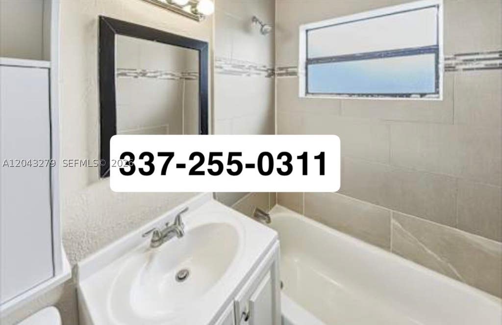 Photo of 4256 N Browning Dr, West Palm Beach, FL 33406 (MLS # A12043279)