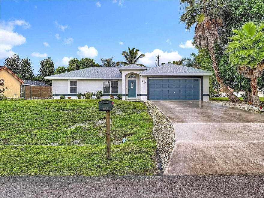 NO HOA! 

Located on a quiet street, this stunningly remodeled, modern 3 Bedroom home offers both privacy and an open flow. Gorgeous kitchen with Granite countertops, SS Appliances, laminate and tile flooring throughout.  The MB features a granite, double-sink vanity, WIC & large shower. No detail was overlooked, a testament to the owners' careful planning & execution.  

French Doors lead to an enclosed backyard, a true retreat featuring mango, avocado, banana, orange and coconut trees. A serene setting that feels like your own private escape. 

Enjoy the sparkling heated pool, hot tub, a beautiful custom fence and a Dakota-style firepit.

Home Warranty transferable until 2028.  EV charging station in the insulated garage & hurricane panels throughout.
