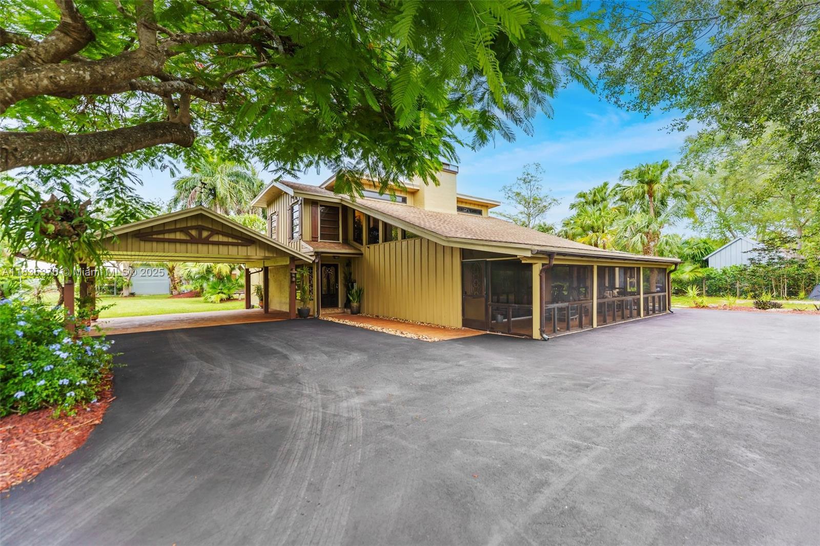 Discover luxury and security at this magnificent gated estate on 1.25 acres in Homestead. This 5-bed, 3.5-bath home boasts over 3,400 SF under air, including a private in-law suite. Inside, you'll find granite countertops, custom cabinets, high ceilings, a real fireplace. Large sliding doors that open to a front screened-in patio, perfect for relaxing. The property is equipped with a 50-amp RV hookup, covered boat/RV parking, and a motorized gate. Property also has new driveway, fruit trees, and a backup generator that powers the entire home. The outdoor oasis features a salt/chlorine pool, hot tub, and outdoor kitchen, while a reinforced concrete bunker provides ultimate security. This ag-zoned property offers no HOA, ensuring privacy and freedom. Don’t miss this unique opportunity!