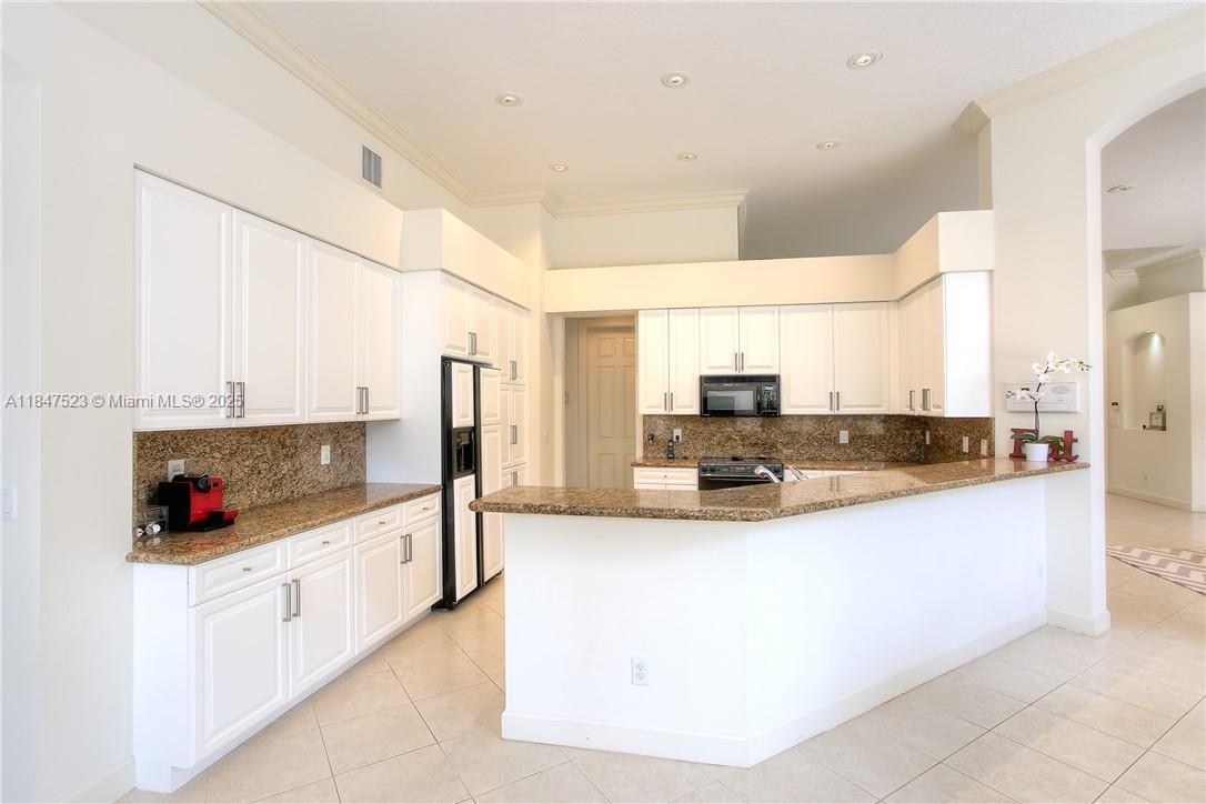 Resort living at its best. This home in the sought after community of Hawks Landing features 4 bedroom 3 bathroom home a neutral pallet throughout, white kitchen cabinetry and stainless steel appliances with granite countertops, and 2 central a/c units. Recent updates include metal roof and hurricane impact windows and doors throughout.