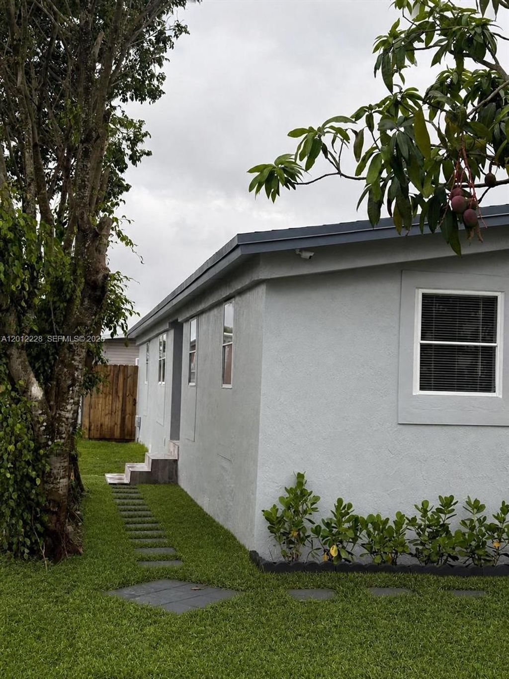 Photo of 21610 NW 7th Ct, Pembroke Pines, FL 33029 (MLS # A12012228)