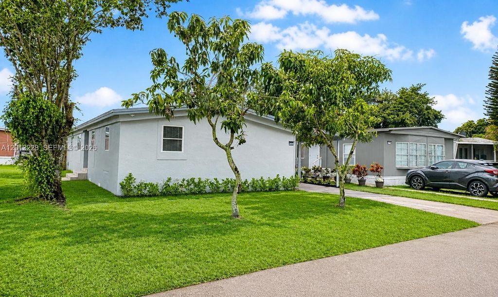 Photo of 21610 NW 7th Ct, Pembroke Pines, FL 33029 (MLS # A12012228)