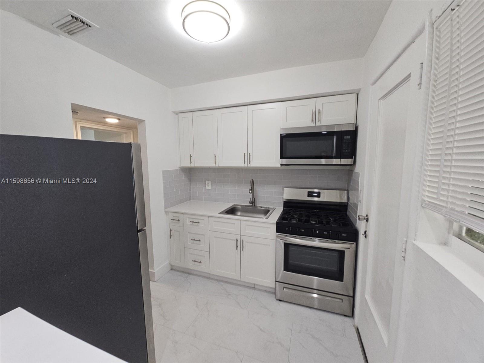 Location, Location, Location...Beautiful 1 + Den /1Bathroom completely renovated (quartz countertop), very comfortable. The apartment has been designed to maximize space and light with Private backyard. Washer/dryer on site. Great area! South Beach has the bustle, the energy, the vibrant sense of adventure — but only a few short miles away, North Beach has the relaxation and the escape.This private building is centrally located just a few blocks from the beach, major transportation, dining and entertainment.