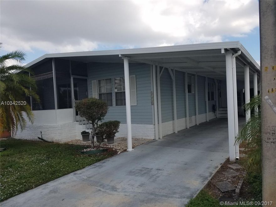 Huge 4 Bed 2 bath manufactured home! Lots of closet space and storage! Covered parking! Close to shopping and airport. Washer and Dryer! community pool!