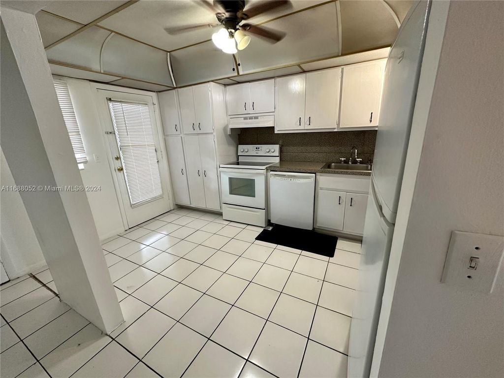 Photo of 3051 NW 46th Ave #203, Lauderdale Lakes, FL 33313 (MLS # A11688052)