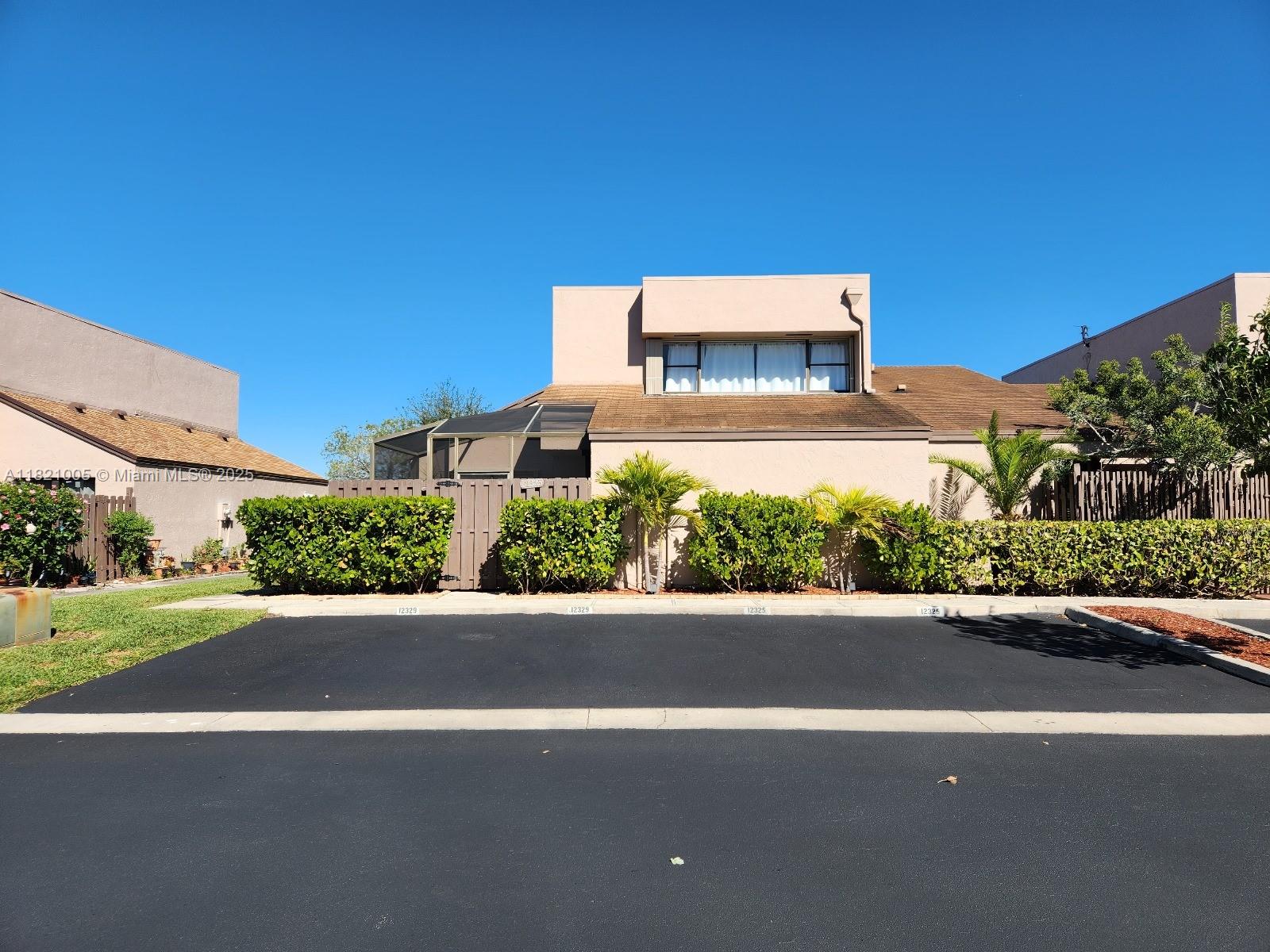 Beautifully updated 2-story townhome located in the highly desirable Flamingo Villas. Serene, gated community Pembroke Pines with 24/7 security. This home boasts a modern open-concept layout with a spacious living and dining area, a sleek kitchen featuring quartz countertops and high-end appliances, and a screened-in patio.The first floor includes a bedroom and full bathroom, walk-in closet. Additional features include accordion hurricane shutters throughout and a brand-new roof.Two assigned parking spots right out front, plus guest parking. fantastic amenities such as tennis courts, fitness center, sauna, steam room, multiple pools, and playgrounds. Ideally located close to CB Smith Park, Memorial Hospital, top-rated schools, great dining, and major highways.