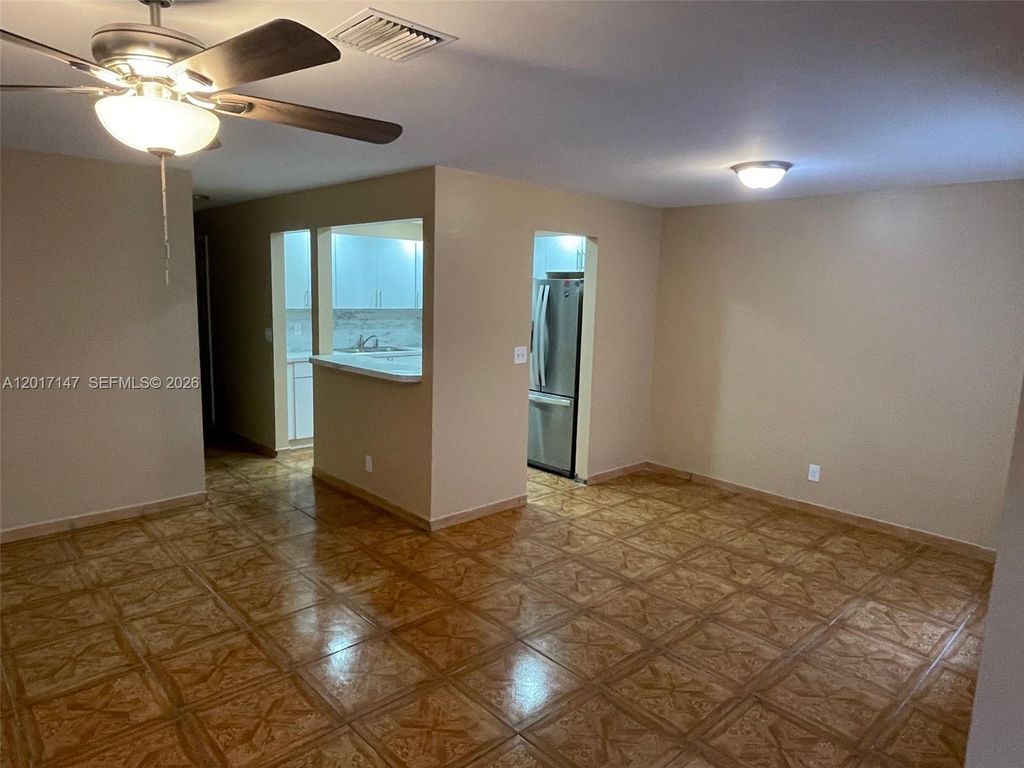 Photo of 5960 NW 20th St #5960, Lauderhill, FL 33313 (MLS # A12017147)
