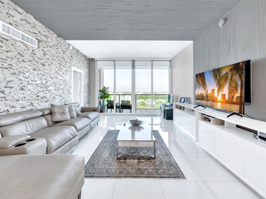 Welcome to your dream home in the sky! This exquisitely remodeled 2-bedroom, 2-bathroom penthouse offers unparalleled luxury and spectacular, unobstructed views of the Miami skyline. Boasting soaring 10-foot ceilings and a bright, open layout, this residence features a spacious balcony—perfect for soaking in breathtaking sunsets. Ideally situated in a prime location, this property is not only a dream home but also an exceptional investment opportunity. Residents enjoy top amenities, including a heated pool, fitness centers, tennis, a jacuzzi, a library, and a BBQ area. Just steps from the beach and minutes from world-class shopping, dining, and parks, Aventura Mall and South Beach, this penthouse embodies the ultimate Miami lifestyle. *Don’t miss out—schedule your private tour today! *