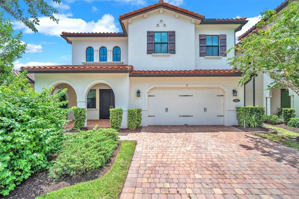 Photo of 1052 SW 113th Way #1052, Pembroke Pines, FL 33025 (MLS # A11973487)