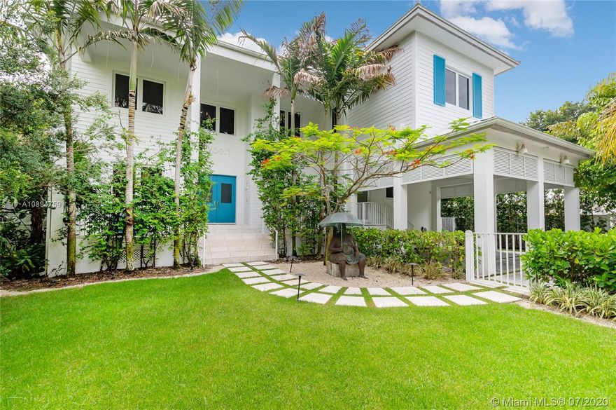 Contemporary, island-style home is modern and timeless at once. A welcoming space with ultra high ceilings and rich wooden floors, the house features large front and back porches, saltwater pool, jacuzzi, six-car carport, and one of the best front yards in Key BIscayne: room for soccer AND trampoline!  Its white marble family style kitchen with center island, generous breakfast bar and best-in-class appliances opens into a fun, relaxed family room. Floor-to-ceiling Carrara Blue fireplace is the centerpiece to a large living room, which flows into the dining room. Please see attachment and download the property disclosure. Easy to show!