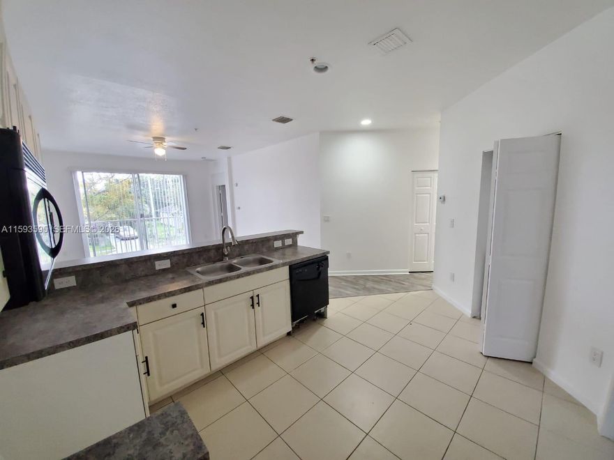 The unit is vacant and it is currently being painted and getting it ready to move in.  Great and spacious 2006 construction 3 bedrooms 2 bathrooms condo with private entry lobby at ground level and living areas in 2nd floor.  All appliances and washer and dryer included, even though they don't show in the pictures.  Laminate waterproof simil wood vinyl flooring.   Great gated complex, security onsite, very clean and well maintained.  No wait for leasing, all ages welcome.   VIRTUAL TOUR VIDEO available upon request. FHA, VA, Conventional, cash OK.  ***AGENTS SEE BROKER REMARKS***