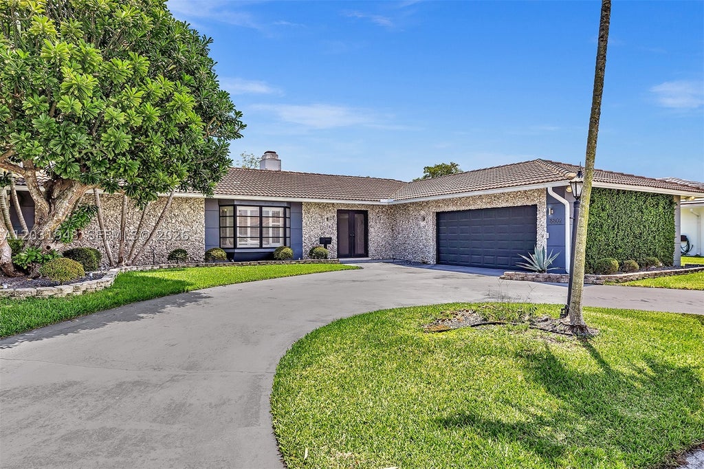 Photo of 5602 S Travelers Palm Ln, Tamarac, FL 33319 (MLS # A12031948)