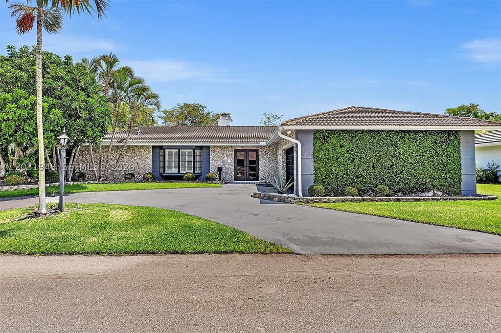 Photo of 5602 S Travelers Palm Ln, Tamarac, FL 33319 (MLS # A12031948)