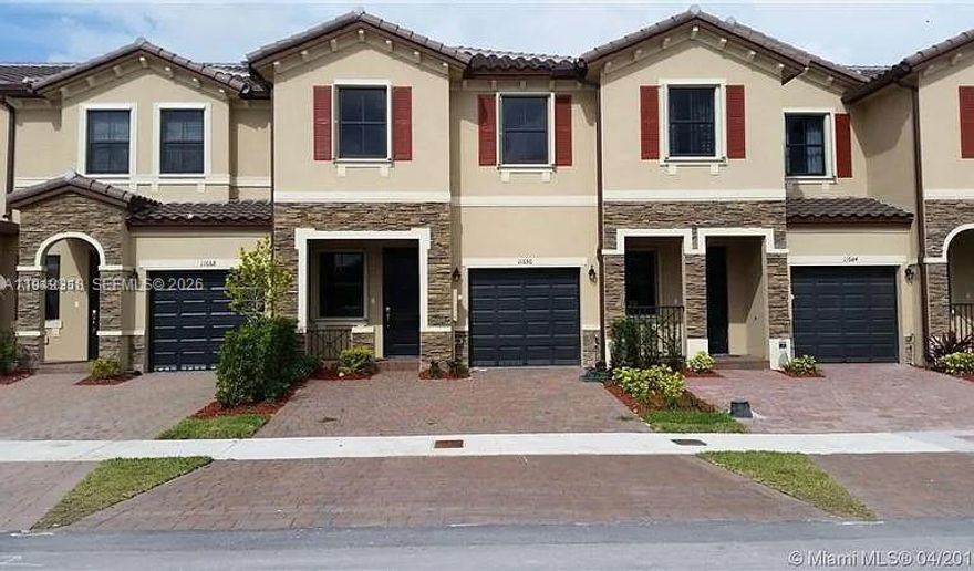 Move-in ready and full of charm—priced to sell! This beautifully maintained corner-unit townhome, built in 2015, offers modern comfort and style in a prime Miami location. The bright and inviting interior features an updated kitchen and bathroom, thoughtfully designed to suit today’s lifestyle. Enjoy the convenience of two assigned parking spaces plus a 1-car garage—ideal for extra storage or to park your dream car—along with a low HOA, making ownership both easy and affordable. Step outside to a cute private patio, perfect for relaxing, entertaining, or enjoying your morning coffee. With well-kept interiors, an open layout, and a peaceful setting, this home is ideal for first-time buyers or a young family seeking to settle into one of Miami’s desirable communities. Owner occupied. Easy to show. Contact listing agent for showings. MORE PHOTOS COMING SOON