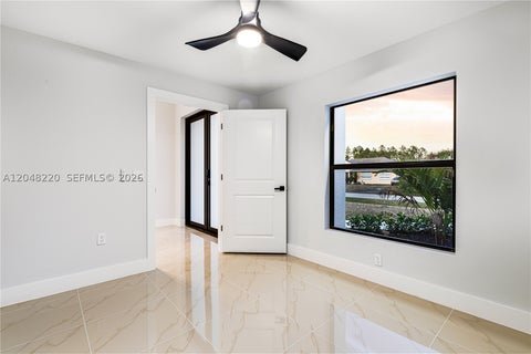 Tiny photo for 450 Mercedes Ct, Lehigh Acres, FL 33972 (MLS # A12048220)