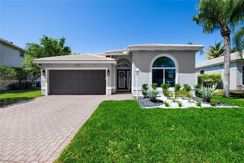 Photo of 1804 NW 145th Ter, Pembroke Pines, FL 33028 (MLS # A12020380)