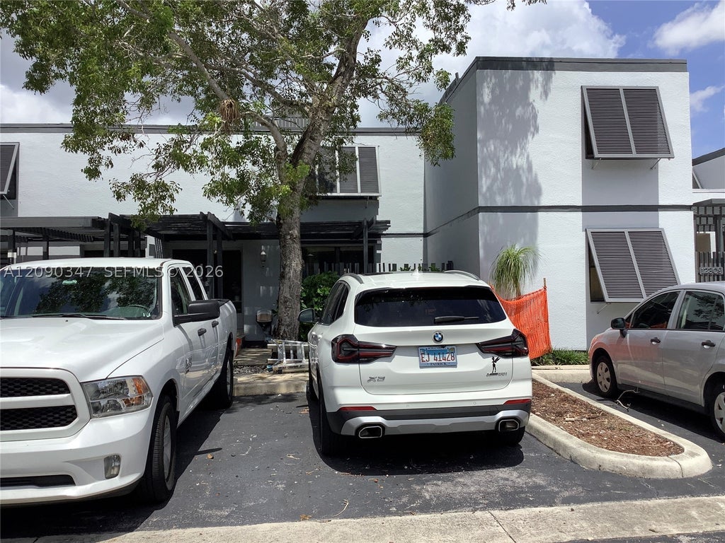 Photo of 12317 NW 11th St, Pembroke Pines, FL 33026 (MLS # A12090347)