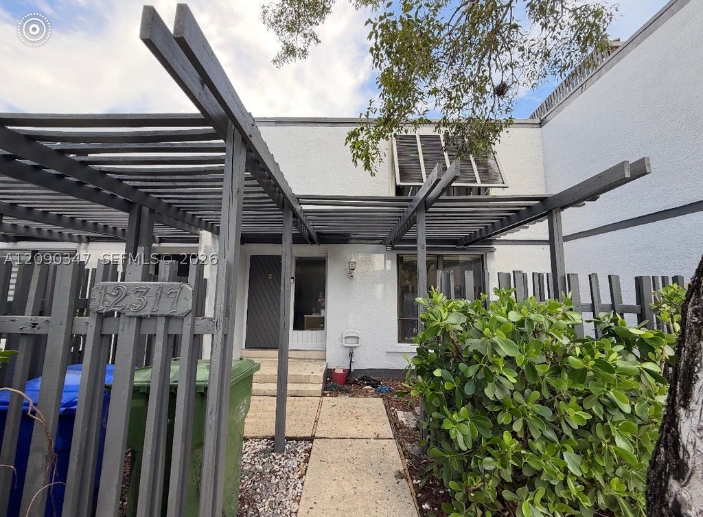 Photo of 12317 NW 11th St, Pembroke Pines, FL 33026 (MLS # A12090347)