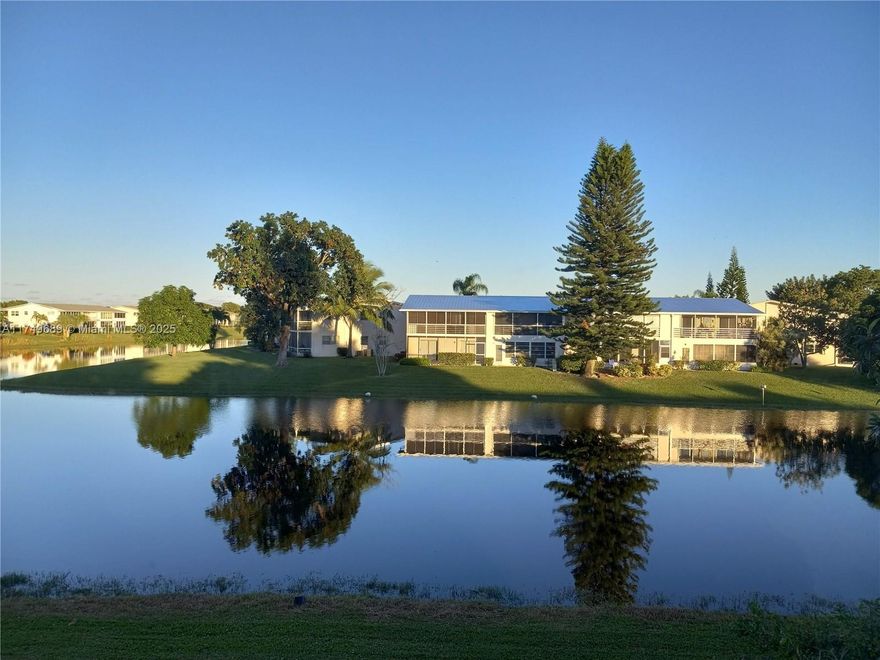 Directly on the water, Experience a stunning water view from this fully furnished turnkey second-floor unit with an enclosed patio. The building is in excellent condition. Century Village provides all the desired amenities and more.