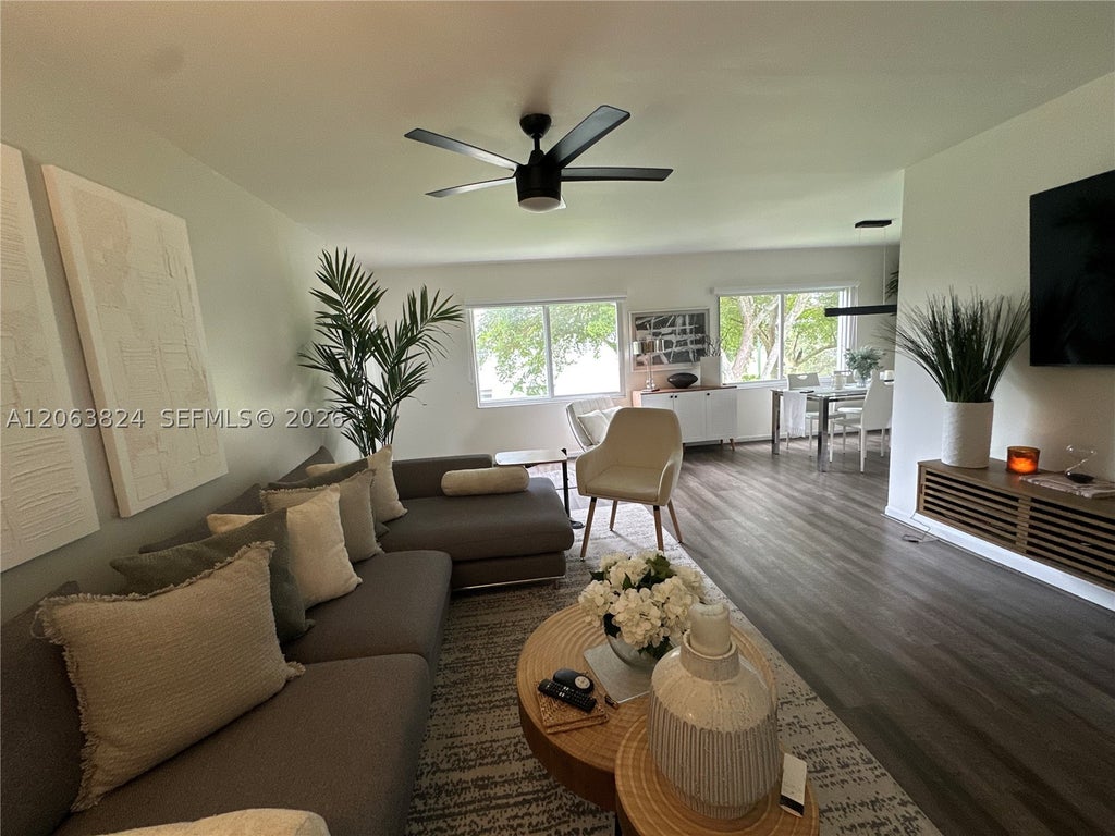 Photo of 13550 SW 6th Ct #301A, Pembroke Pines, FL 33027 (MLS # A12063824)