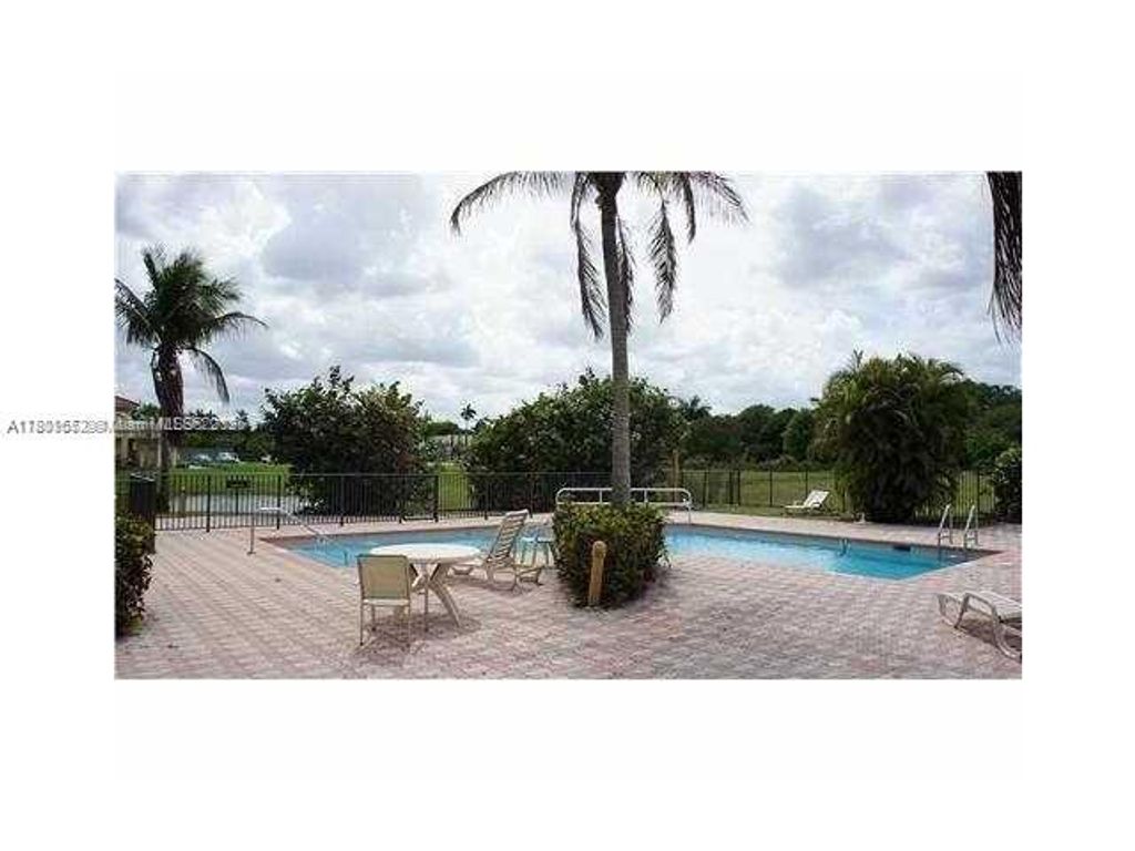 Photo of 4785 SW 62nd Ave #203, Davie, FL 33314 (MLS # A11801652)