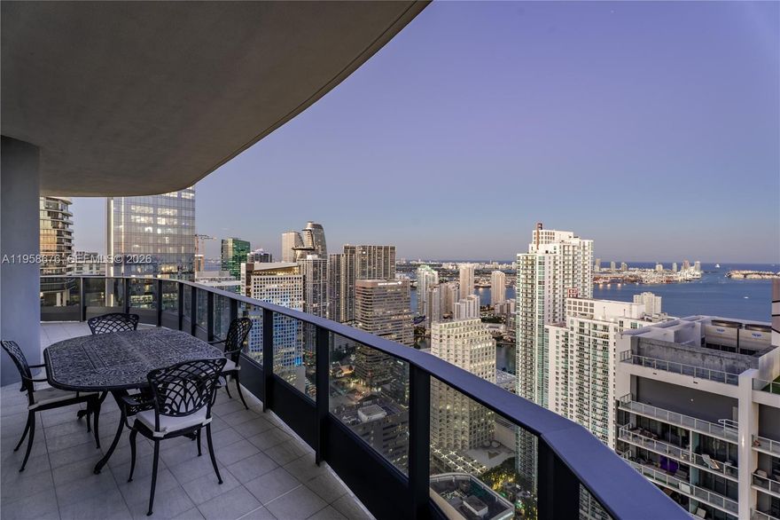 Welcome to Brickell Flatiron PH#5408 residence a 3bed/3.bath North East Corner Penthouse with breathtaking panoramic views of the water and Miami skyline from your expansive wrap around terrace. Features include: custom Italian Snaidero kitchen, Miele appliances, 10 ft floor to ceiling windows, electric blinds, porcelain wood tile throughout the condo with marble floors in the bathrooms, custom closets bedrooms and pantry. Additional features that set this Penthouse apart are two express destination elevators only available for the PH floors. 3 Parking spots (2 assigned + 1 valet.) Have access to resort style amenities including: 64th-Floor Rooftop Pool w/ Towel Service, Rooftop fitness center w/yoga & pilates, spa+steam room, sauna, lap Pool, children's Pool, theater, billiards room. Steps from world class restaurants and shopping including Brickell City Centre. Video Available upon request.