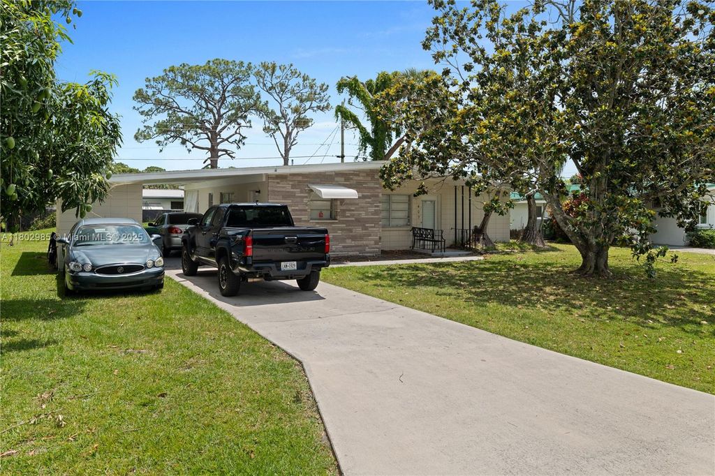 Photo of 409 Poplar Ave, Port St Lucie, FL 34952 (MLS # A11802985)