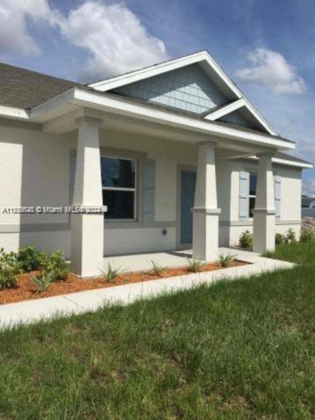 Photo of 2240 SW Lawrence St, Port Saint Lucie, FL 34953 (MLS # A11588620)