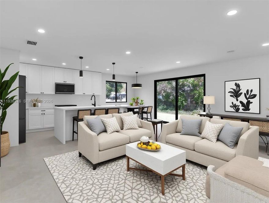 Stunning brand-new construction 2025 home in an exceptional South Miami location, just minutes from the University of Miami and situated within the Sunset Elementary School boundaries. This thoughtfully designed residence offers a modern open-concept layout filled with natural light and finished with porcelain tile flooring throughout. The chef’s kitchen features custom cabinetry, quartz countertops, a large waterfall-edge island, sleek black fixtures, and contemporary pendant lighting, complemented by recessed LED lighting throughout the home for a clean, modern feel. Additional highlights include impact windows and doors, spacious bedrooms, custom closets and beautifully designed bathrooms. Two of the bedrooms are connected by a stylish Jack-and-Jill bathroom.  Every detail has been carefully selected to combine functionality, durability, and timeless design. Enjoy close proximity to UM, Sunset Place, parks, dining, and major highways, making this home perfect for both everyday living and long-term value. A rare opportunity to own a move-in-ready new construction home in one of Miami’s most desirable neighborhoods.