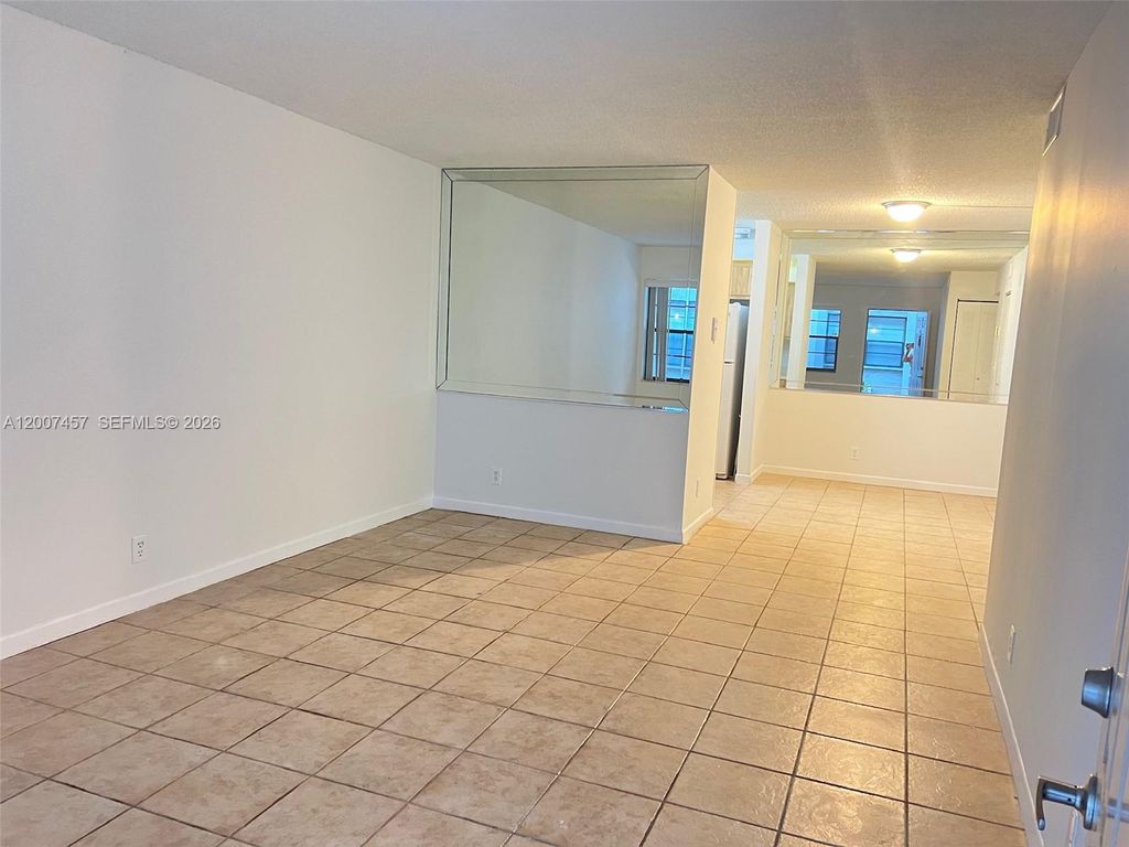 Photo of 3215 NW 102nd Ter #3215, Coral Springs, FL 33065 (MLS # A12007457)
