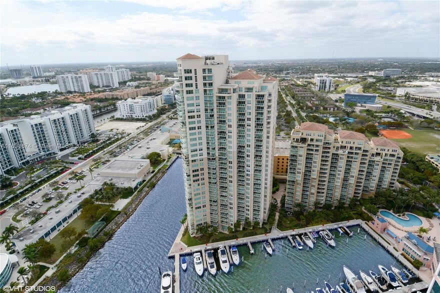 Wow! Enter & see Fantastic Ocean, Intracoastal & City Views. *Unit comes with 2 Parking Spaces and Oversized AC Storage Room*! This spacious 3 bd/ 3ba - 1,650 SF has a large terrace, perfect for enjoying the views. Coveted split bedroom floorplan offers total privacy for Primary Suite. Open Kitchen w/ European cabinets, granite countertops, & stainless steel appliances. The condo was just entirely painted! A must see! Move In Ready!  Enjoy the  5* Amenities Of A Private Resort On 24 Hour Guard Gated Acres Surrounded On 2 Sides By Water, 2 Story Spa & Health Club, 2 Pools, Tennis Courts, Gym, Private 65 Slip Marina, Private Park, Valet, Security, Concierge And Much More!