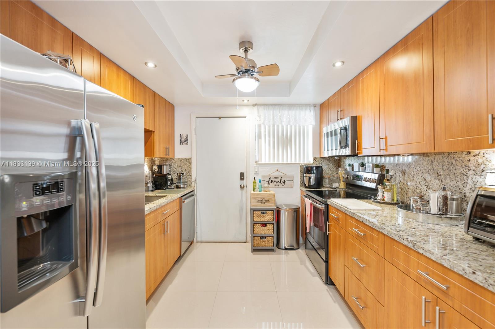 This spacious and inviting condominium offers two bedrooms and two bathrooms, creating a comfortable living space. Conveniently situated near prominent stores and a shopping center, including the renowned Bal Harbour Shops and the beautiful beach, this condo is ideally located on the second floor. The kitchen is equipped with high-quality stainless steel appliances, adding a touch of elegance to the unit. Furthermore, property have a generous amount of space for residents to enjoy. Its outstanding location is certainly worth highlighting.