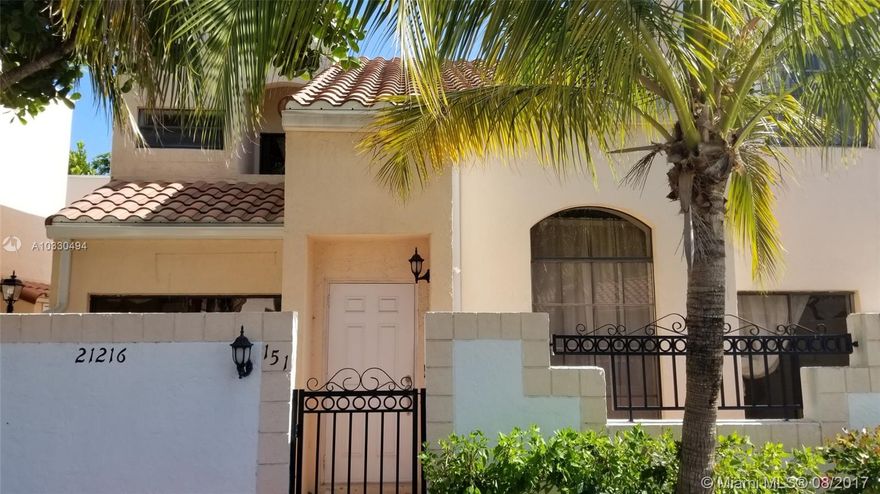 Spacious Two Story, Three Bedroom Townhouse in the heart of Aventura.  Corner Unit with High Ceilings.   Kitchen and baths have been remodeled with granite in the kitchen.  New wood flooring.  Spacious walled-in patio.   Guard gated community. Pool.  Maintenance fees include cable and water.  A great starter home.     Owner Agent.
