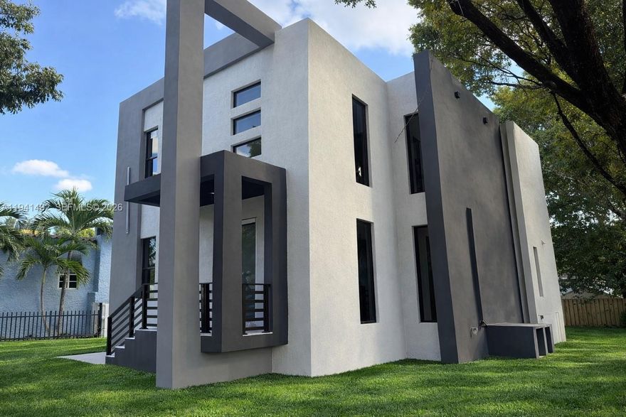 Stunning new construction luxury home in the heart of Miami. This modern 4-bedroom, 4.5-bath residence offers approximately 2,750 sq ft under A/C on a 6,300 sq ft lot, including an adjacent parcel. Designed for both comfort and functionality, the first floor features a bedroom with en-suite bath, a powder room, expansive open living areas, soaring ceilings, and smart-home readiness.
The second level showcases a spacious primary suite with walk-in closets and a spa-inspired bathroom, along with additional well-appointed bedrooms. Ideally located near LoanDepot Park and the future Miami Freedom Park soccer stadium, and just minutes from Brickell, Downtown, and Coral Gables. Some images include virtual staging or AI renderings to illustrate the intended final appearance. Property is near completion; select photos may depict proposed landscaping, pool, or finishes.