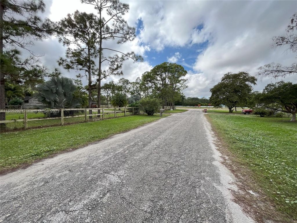 Photo of 12970 N 53rd Rd N, Unincorporated Palm Beach County, FL 33411 (MLS # A11505292)
