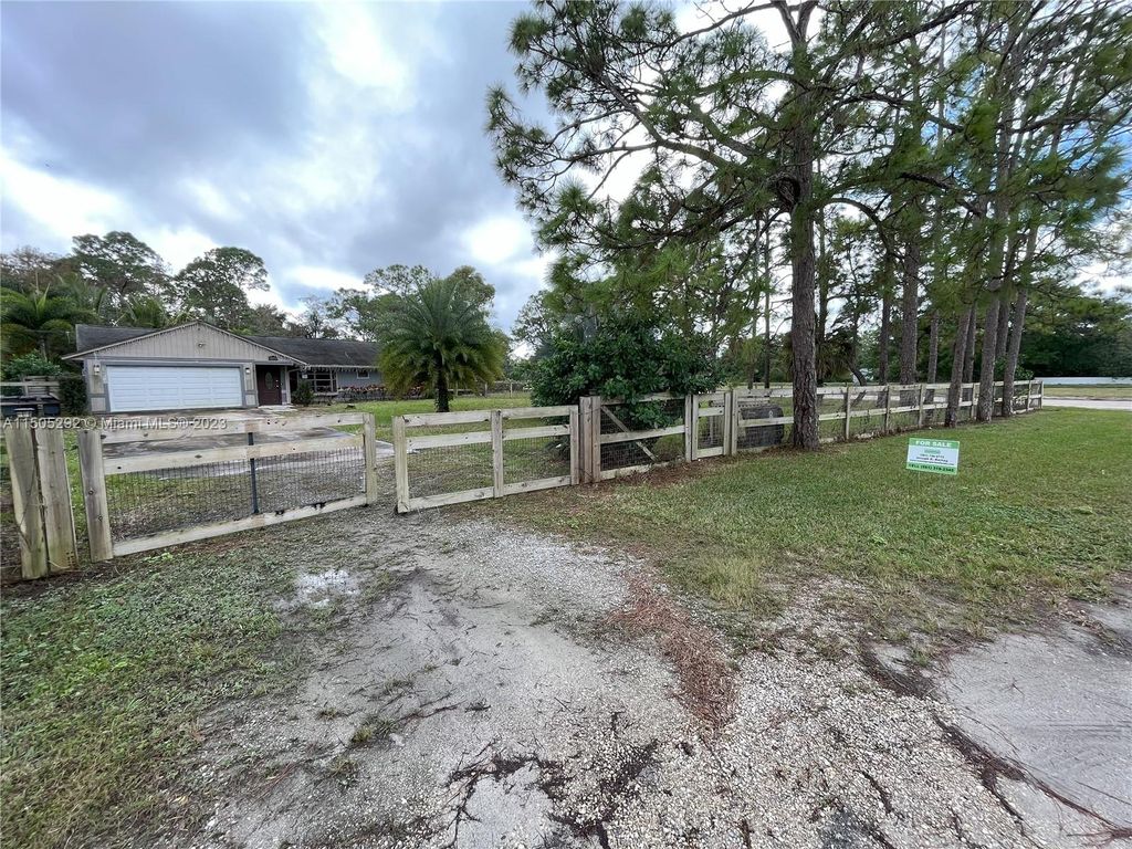 Photo of 12970 N 53rd Rd N, Unincorporated Palm Beach County, FL 33411 (MLS # A11505292)
