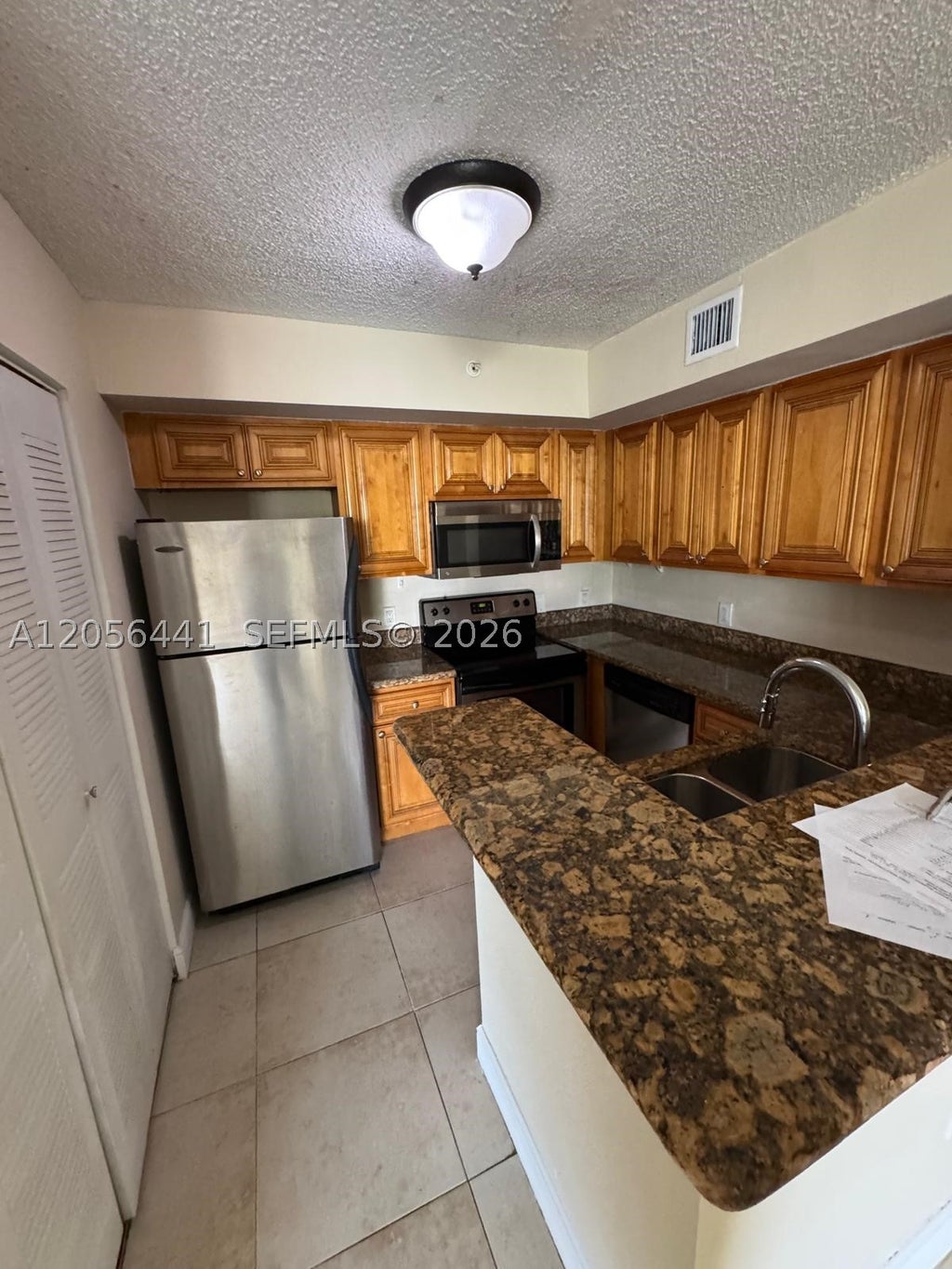 Photo of 12142 St Andrews Pl #110, Miramar, FL 33025 (MLS # A12056441)