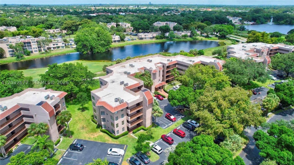 Photo of 1931 Sabal Palm Dr #203, Davie, FL 33324 (MLS # A12042677)