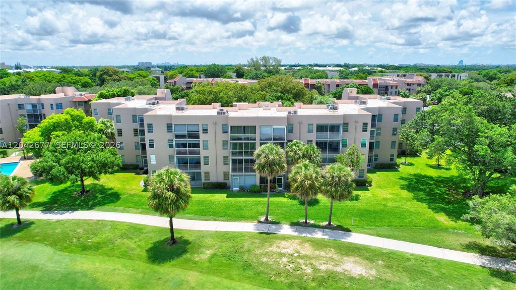 Photo of 1931 Sabal Palm Dr #203, Davie, FL 33324 (MLS # A12042677)
