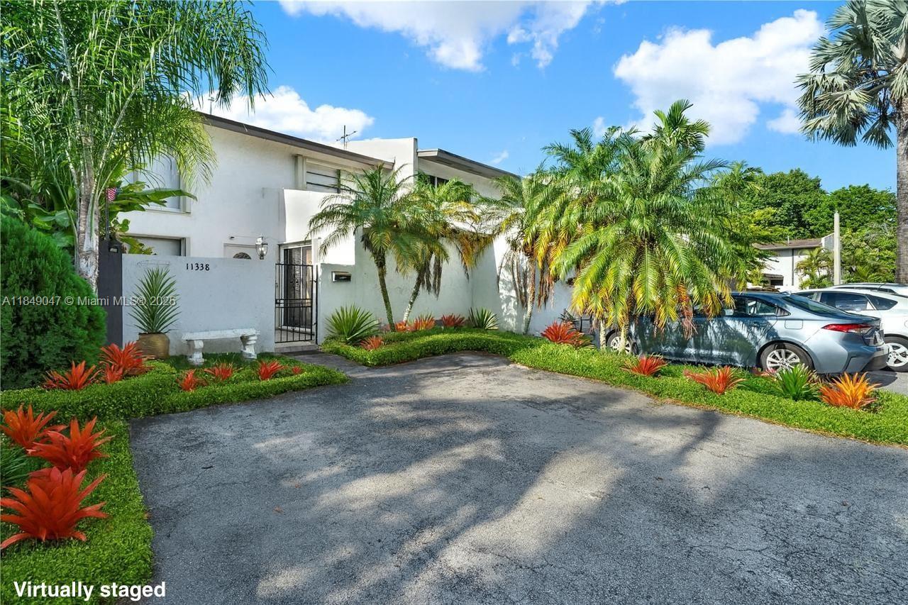 Welcome to your new home in Snapper Creek! This 3 bed / 2 baths townhouse offers a great sized backyard and a patio in the front. The layout is both functional and flexible, featuring a bedroom and full bathroom on the first floor. Includes tile floors all throughout first floor. The expansive primary bedroom includes a spacious walk in closet with organization. Two parking spots right out front! Enjoy access to community amenities like the resort-style pool, tennis courts, basketball courts, kids playground and dog park. Conveniently located near the Palmetto Expressway, the Florida Turnpike and minutes away from Town & Country mall. Schedule your private tour today!