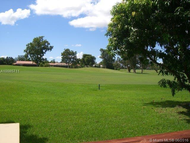 Great 4/3 Split level Townhouse in the heart of the Country Club of Miami. A spacious home with open common areas,beautiful views of the Golf Course from the living, dining and Florida rooms. Master bedroom opens to a terrace with direct golf course views and features a large en-suite bathroom and spacious walk-in closet. Unit needs some cosmetic updates.